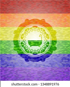bathtub icon inside emblem on mosaic background with the colors of the LGBT flag