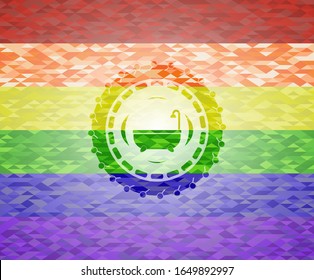 bathtub icon inside emblem on mosaic background with the colors of the LGBT flag