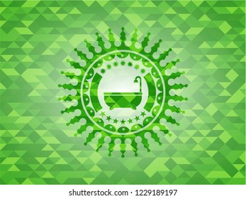 bathtub icon inside green emblem with mosaic background