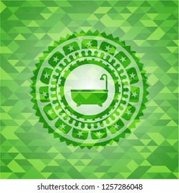 bathtub icon inside green emblem. Mosaic background