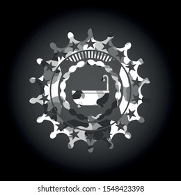 bathtub icon inside grey camouflaged emblem