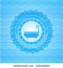 bathtub icon inside light blue water emblem.