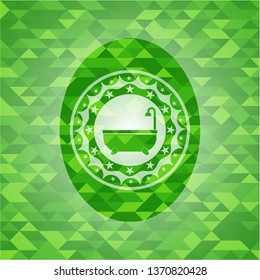 bathtub icon inside realistic green mosaic emblem