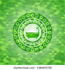 bathtub icon inside realistic green emblem. Mosaic background
