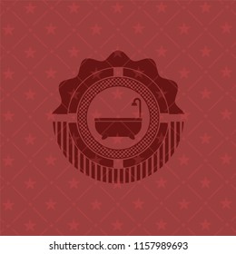 bathtub icon inside red emblem