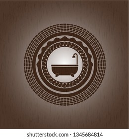 bathtub icon inside retro style wooden emblem