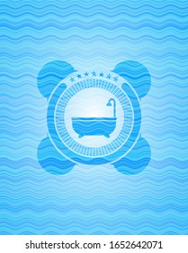 bathtub icon inside water wave representation emblem.