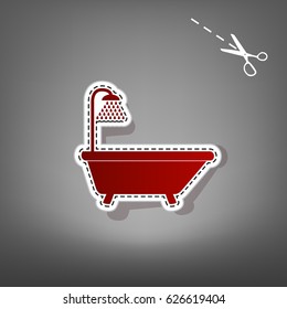 Bathtub sign. Vector. Red icon with for applique from paper with shadow on gray background with scissors.