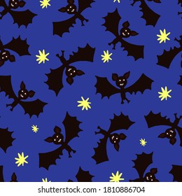 Bats flying in the starry sky for the Halloween holiday.Decorative element for textiles, background, Wallpaper, packaging paper, fabric.
