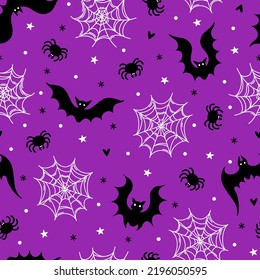 Bats in night sky seamless vector pattern. Halloween symbols - vampires, spider web, insects. Scary silhouettes isolated on purple background. Illustration for holiday wallpaper, textile, wrapping