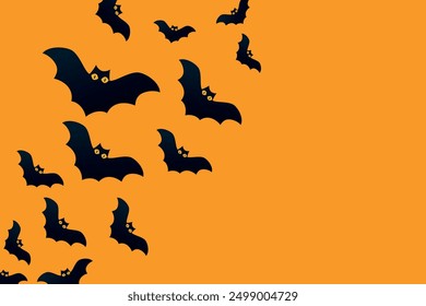 Bats on an orange background. Halloween holiday concept. Black silhouettes. Empty space for text. Copy space. Greeting card, party invitation.