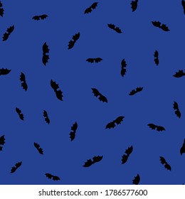 Bats silhouettes halloween seamless vector pattern. Dark ominous sky surface print design for fabrics, stationery, backgrounds, wrapping paper, scrapbooking, and packaging.