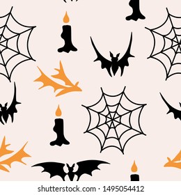 Bats, spider nest and candels in a halloween pattern design, perfect to use on the web, or in print, for surface design