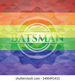 Batsman emblem on mosaic background with the colors of the LGBT flag