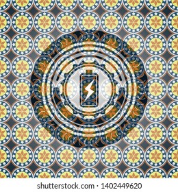 battery charging icon inside arabic badge background. Arabesque decoration.