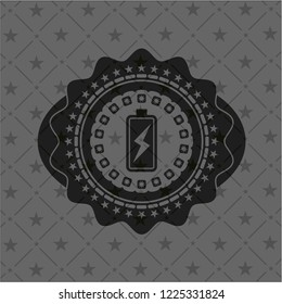 battery charging icon inside black emblem. Vintage.