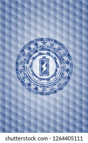 battery charging icon inside blue badge with geometric pattern background.