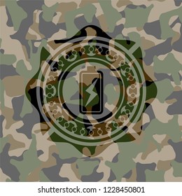 battery charging icon inside camouflage emblem