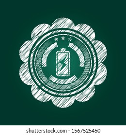 battery charging icon inside chalk emblem written on a blackboard