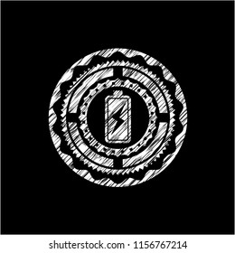 battery charging icon inside chalkboard emblem written on a blackboard