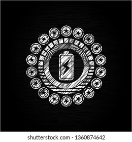 battery charging icon inside chalkboard emblem