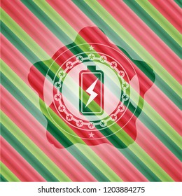 battery charging icon inside christmas emblem background.