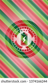 battery charging icon inside christmas emblem.