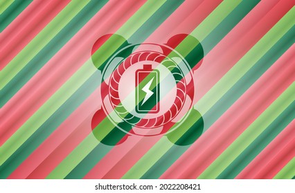 battery charging icon inside christmas emblem. 