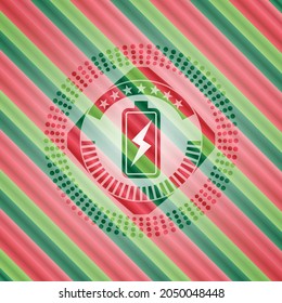 battery charging icon inside christmas colors style emblem. 