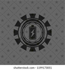 battery charging icon inside dark badge or emblem