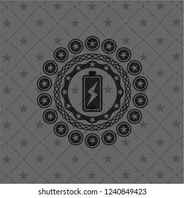 battery charging icon inside dark emblem. Retro