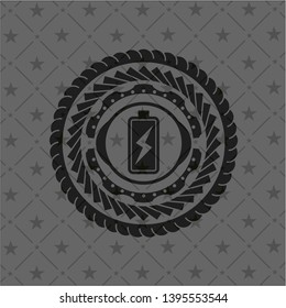 battery charging icon inside dark badge or emblem