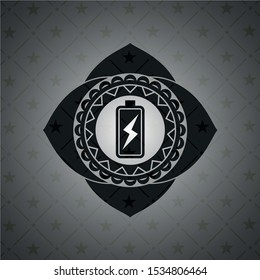 battery charging icon inside dark emblem. Retro