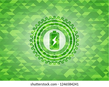 battery charging icon inside green emblem with mosaic ecological style background