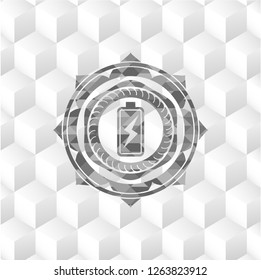 battery charging icon inside grey badge with geometric cube white background