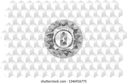 battery charging icon inside grey emblem with geometric cube white background