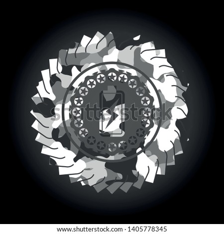 battery charging icon inside grey camouflaged emblem