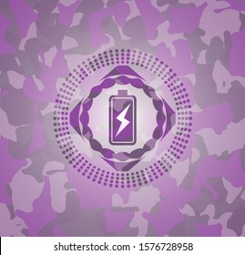 battery charging icon inside pink camouflaged emblem