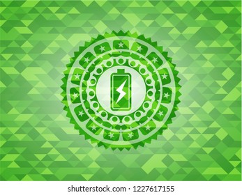 battery charging icon inside realistic green emblem. Mosaic background