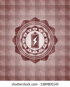 battery charging icon inside red seamless emblem with geometric background.