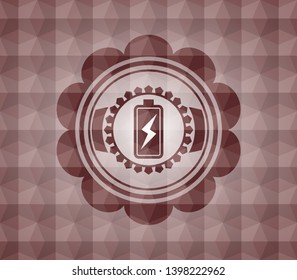 battery charging icon inside red seamless emblem with geometric background.