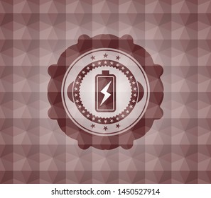 battery charging icon inside red seamless badge with geometric background.