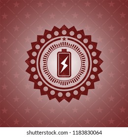 battery charging icon inside retro red emblem