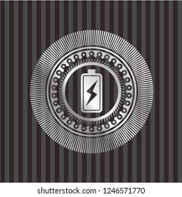 battery charging icon inside silver badge or emblem