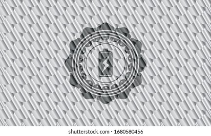 battery charging icon inside silver emblem. Scales pattern. Vector Illustration. Detailed.
