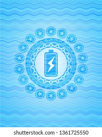 battery charging icon inside sky blue water badge background.