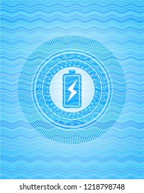 battery charging icon inside water style emblem.
