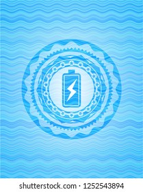 battery charging icon inside water representation style badge.