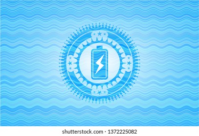 battery charging icon inside water wave emblem.