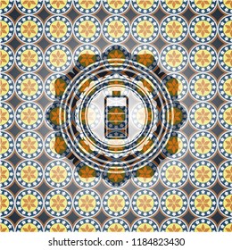 battery icon inside arabesque style badge. arabic decoration.
